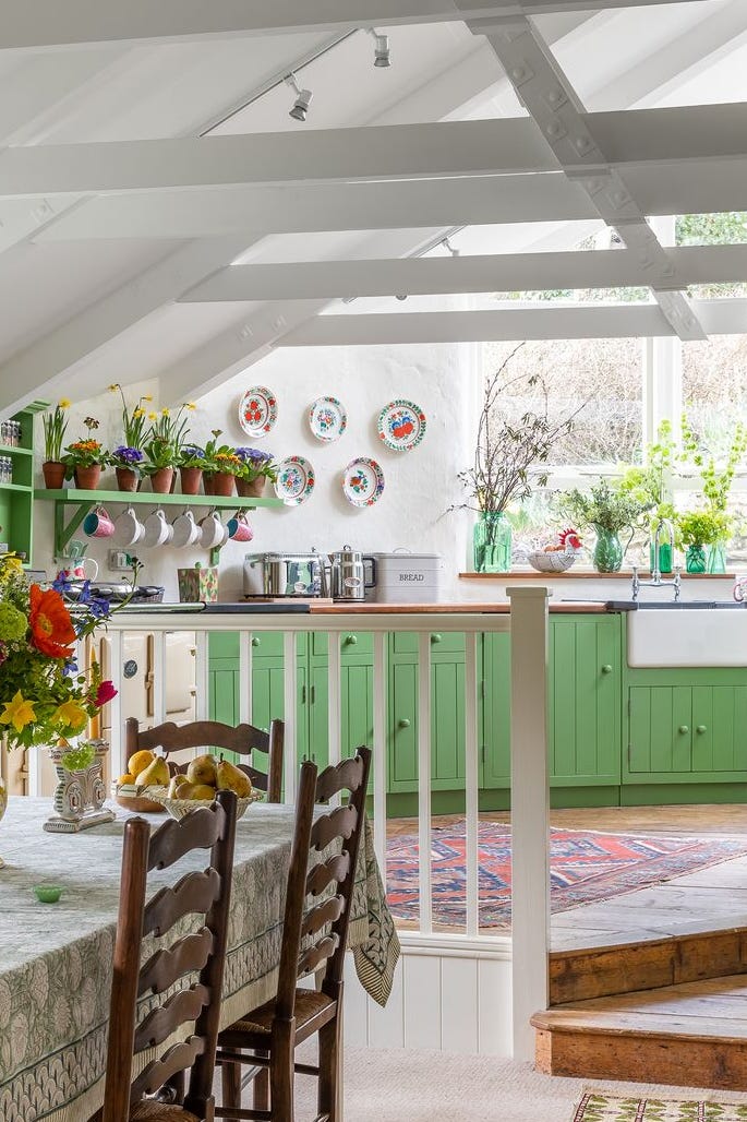 kitchen with green cabinets