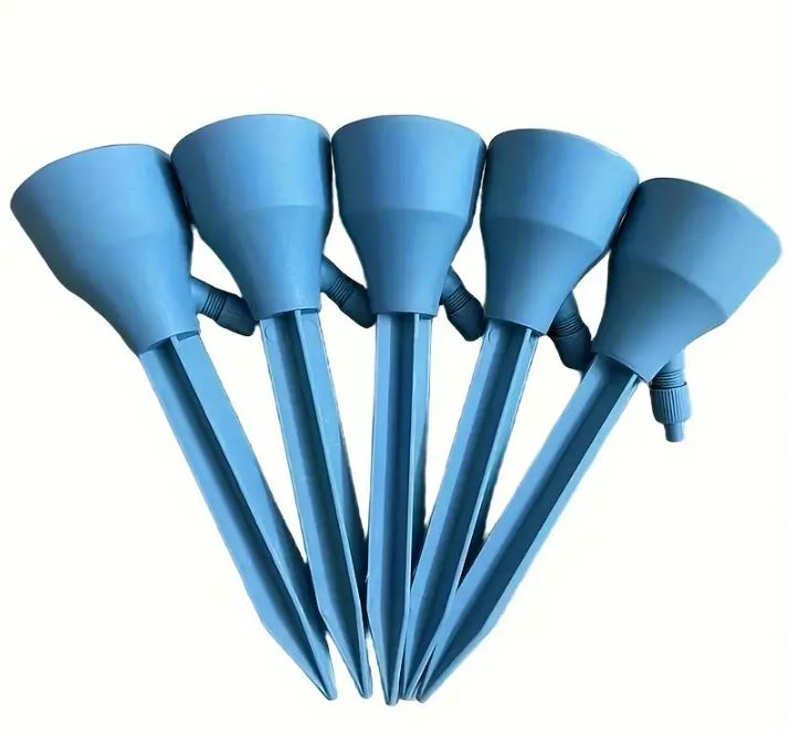 Five blue plastic watering spikes.