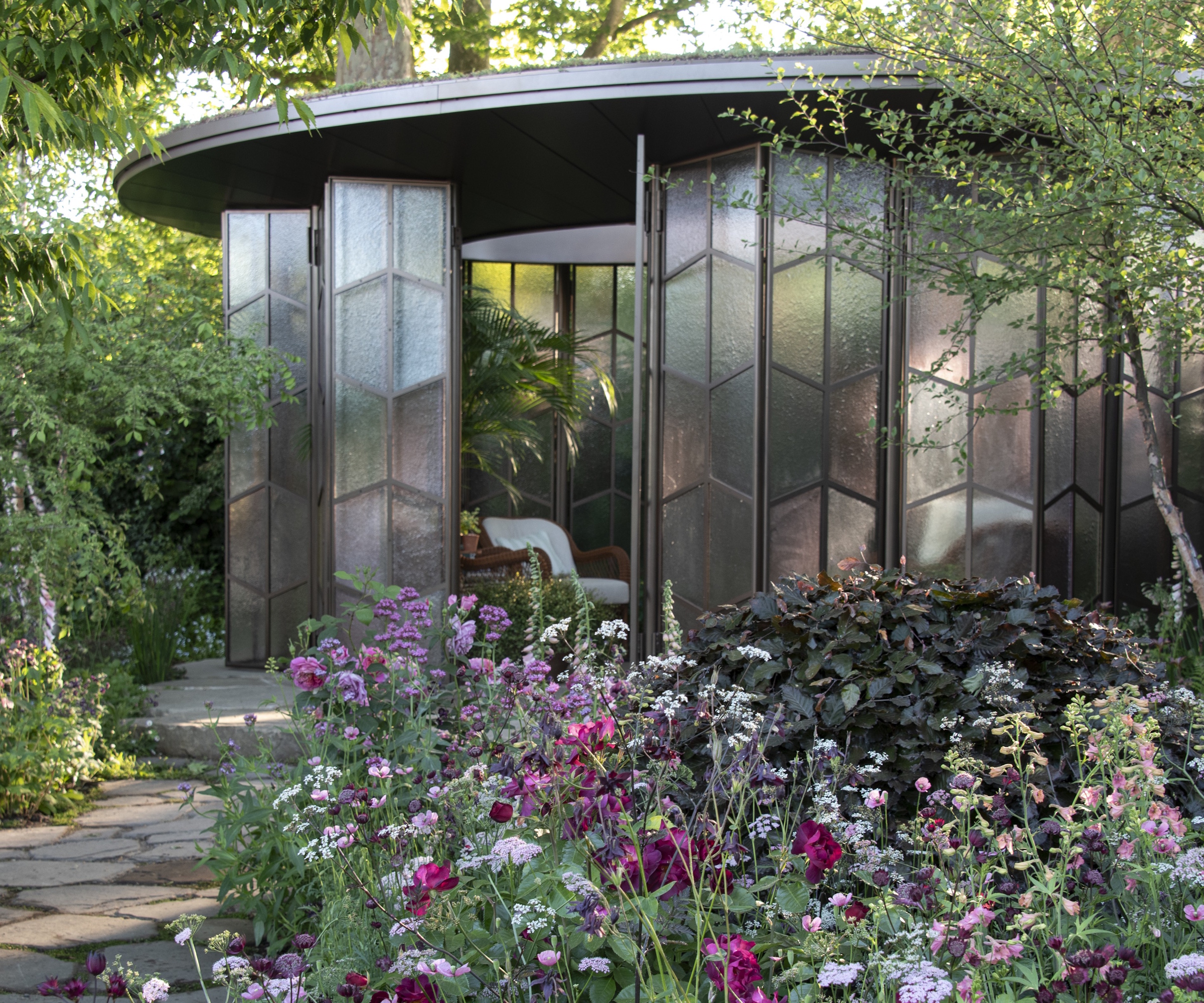 The Glasshouse Garden by Jo Thompson, with dense perennial planting, at the RHS Chelsea Flower Show 2025