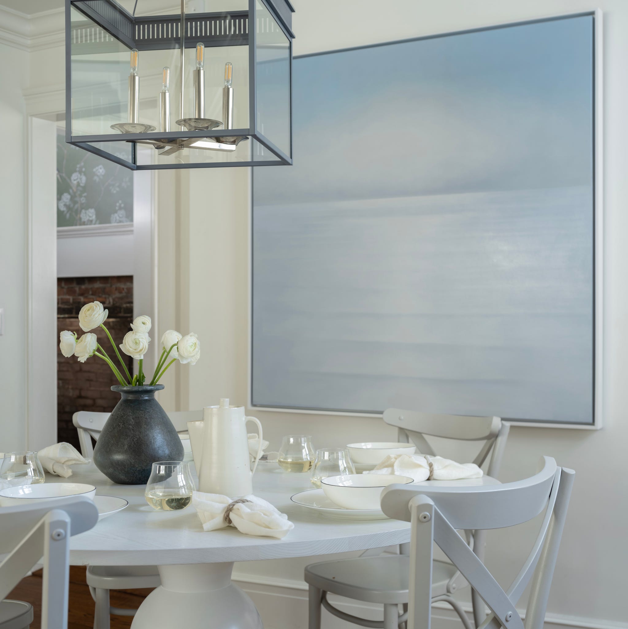 breakfast room with dining table and art on the wall