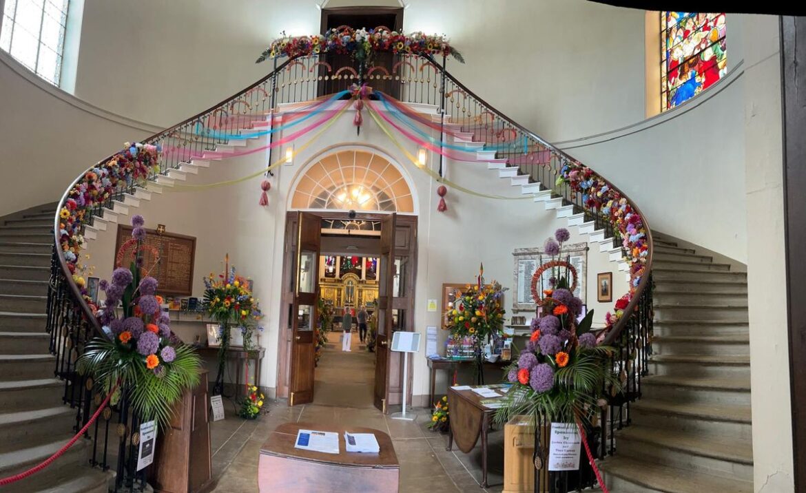 Flower club’s ‘Festival of Colour’ a great success! stunning staircase with a festival vibe by Jackie Charnock and Tina Carser