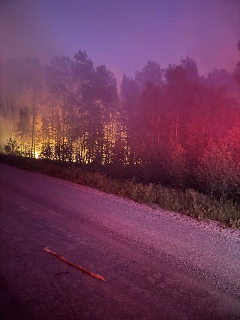 A wildfire burns near Garden Hill Anisininew Nation in northeastern Manitoba in July 2025. 