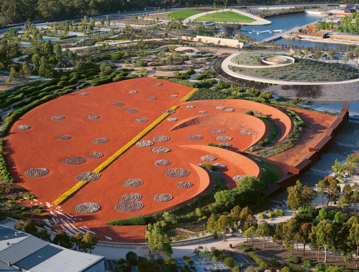 A New Book Cultivates a Rich Survey of 300 Magnificent Gardens — Colossal an aerial view of a contemporary garden with a large, terracotta-color sculptural platform