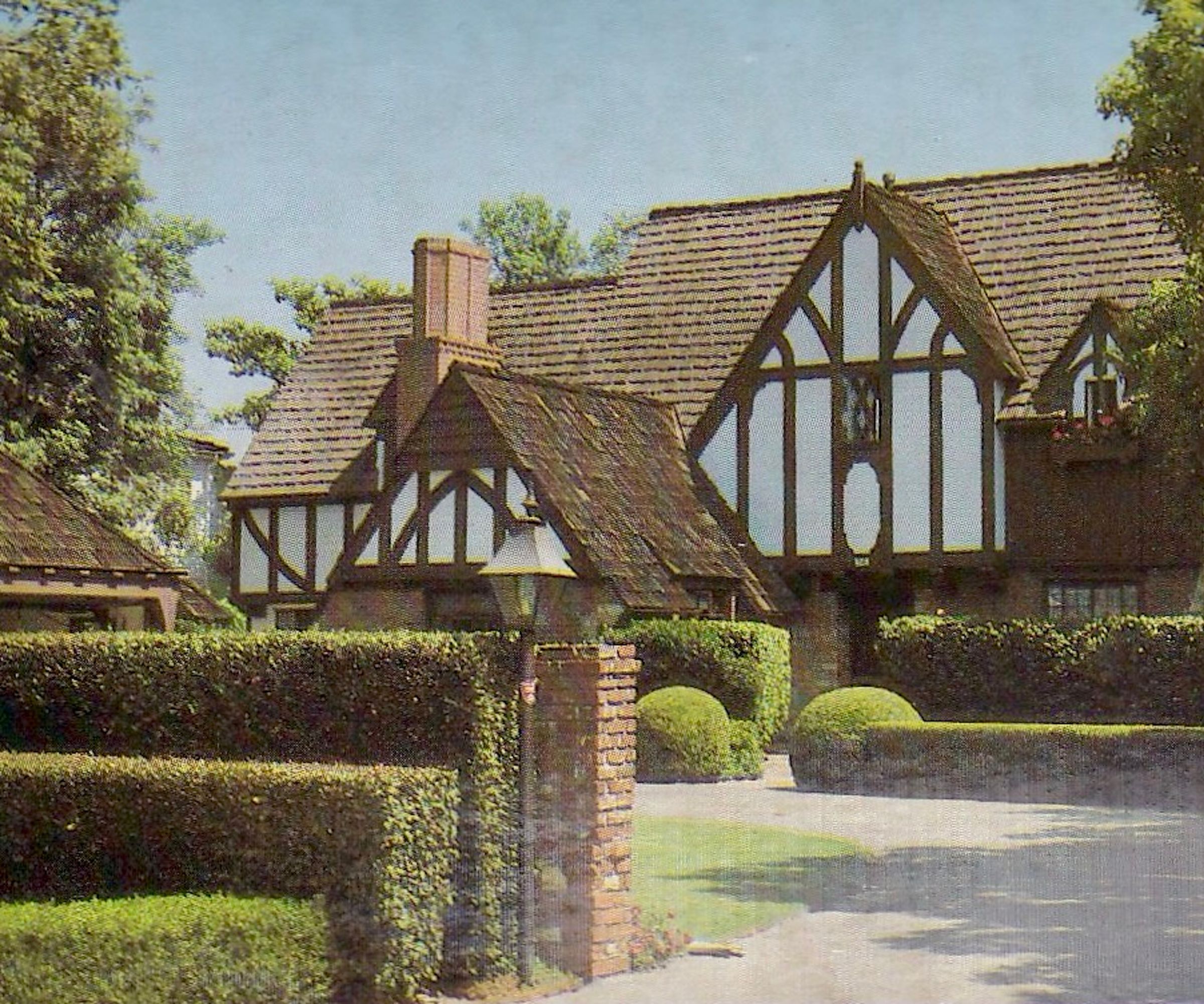 Vintage souvenir postcard published circa 1978 from the Homes of Movie and Television Stars series, depicting mansions and grand estates of Hollywood celebrities in Los Angeles, California, here a view of the grand Tudor style estate of comedian and actress Goldie Hawn