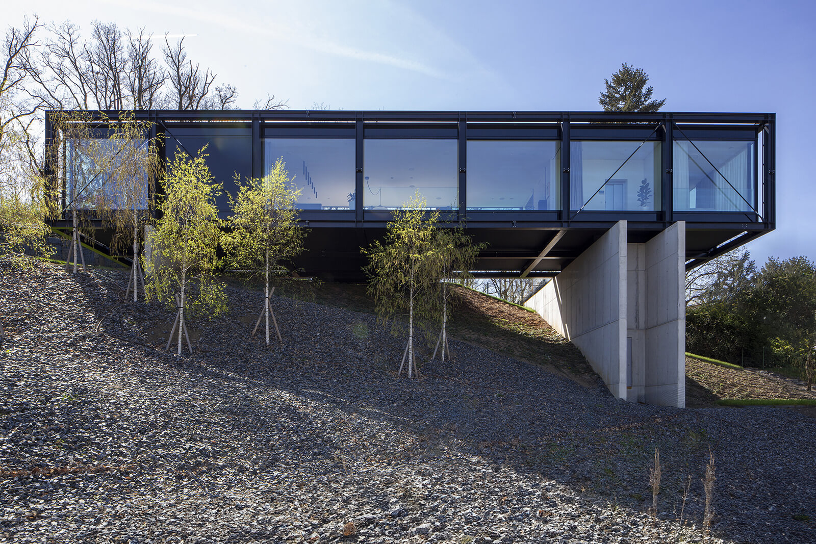 The residence’s form responds to the steep landscape | Villa Sidonius | Stempel & Tesar architekti | STIRworld