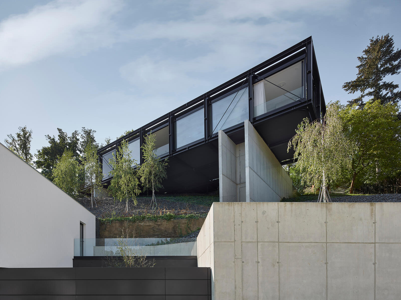 The building rests on monolithic concrete pillars | Villa Sidonius | Stempel & Tesar architekti | STIRworld