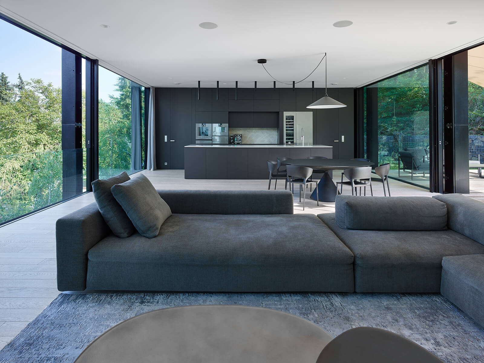 Villa Sidonius - living area with dining and kitchen | Villa Sidonius | Stempel & Tesar architekti | STIRworld