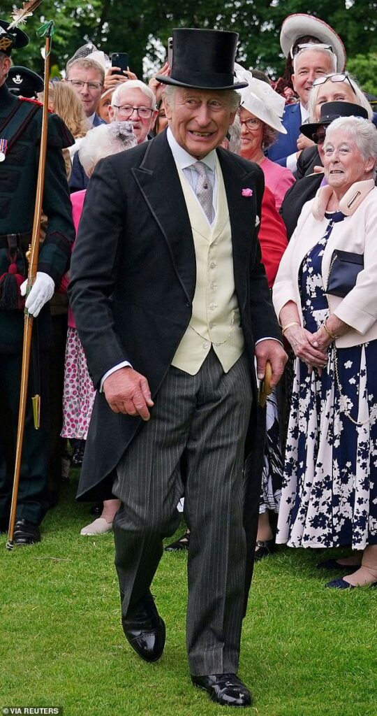 King Charles appeared cheerful as he joined the Sovereign's Garden Party at the Palace of Holyroodhouse in Edinburgh today