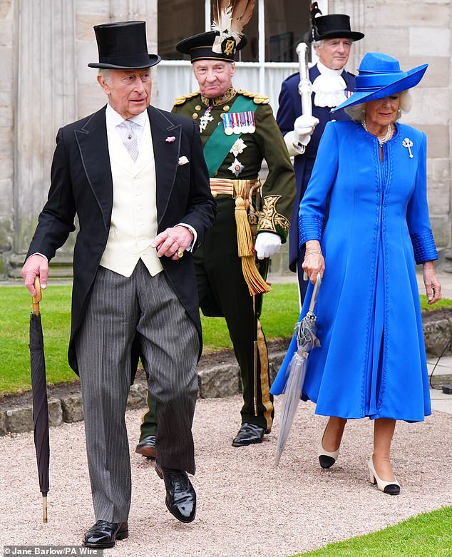 Pictured: King Charles and Queen Camilla during the Sovereign's Garden Party at the Palace of Holyroodhouse in Edinburgh