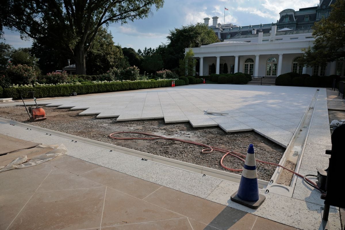 Work continues in paving over the White House Rose Garden lawn on July 23, 2025 in Washington, DC. 