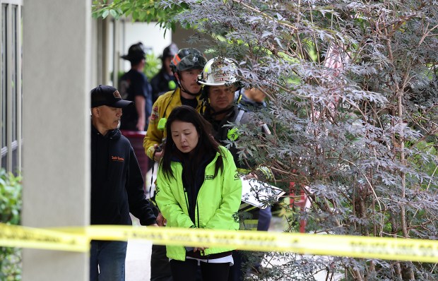 The family that owns Sushi Garden takes in the damage...