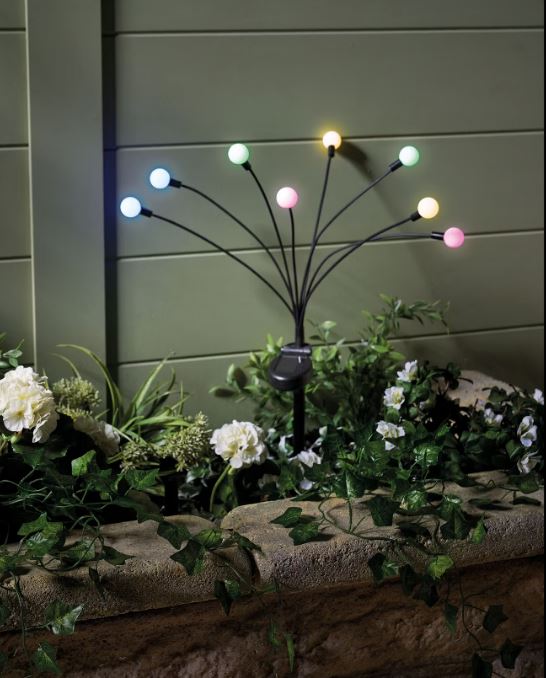 Solar-powered garden lights with multicolored bulbs.