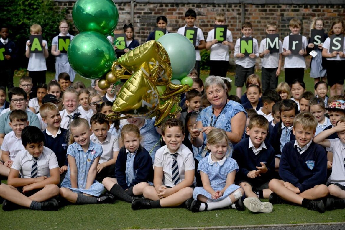 Green fingered teaching assistant helps children bloom in primary school’s garden Great and Green Award winner Glenis Sharp and pupils of Alderman Bolton Primary Academy
