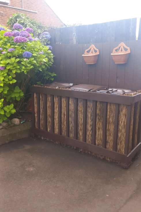 DIY bin enclosure with bamboo screen.