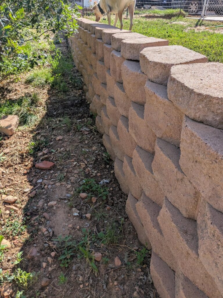 Safe to landscape above retaining wall? Safe to landscape above retaining wall?