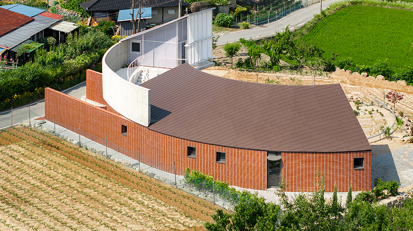 circular house by sukchulmok + BRBB encloses vegetable garden on korean farmland