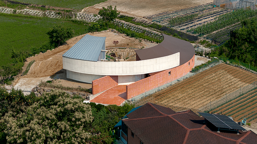 circular house by sukchulmok + BRBB encloses vegetable garden on korean farmland