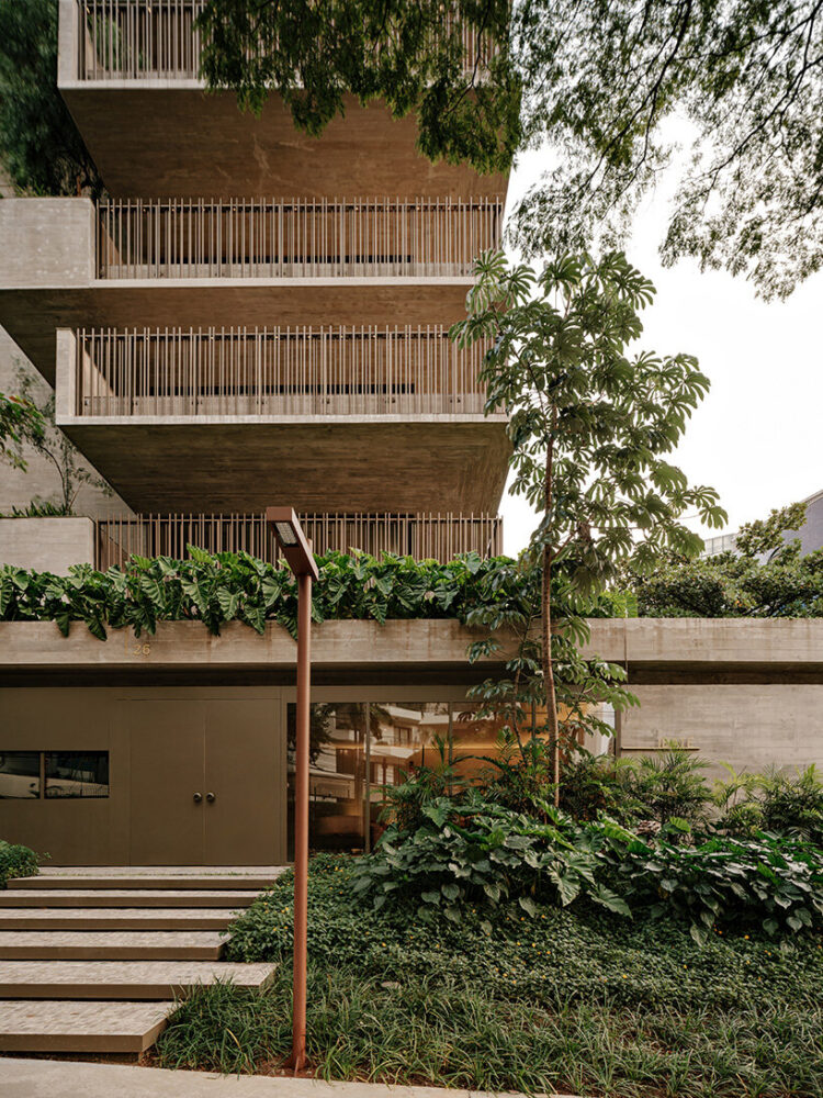 cross-ventilation and dense greenery help reduce the need for air conditioning