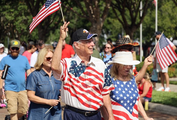 Winter Garden mayor John Rees walks during the Masonic Lodge...