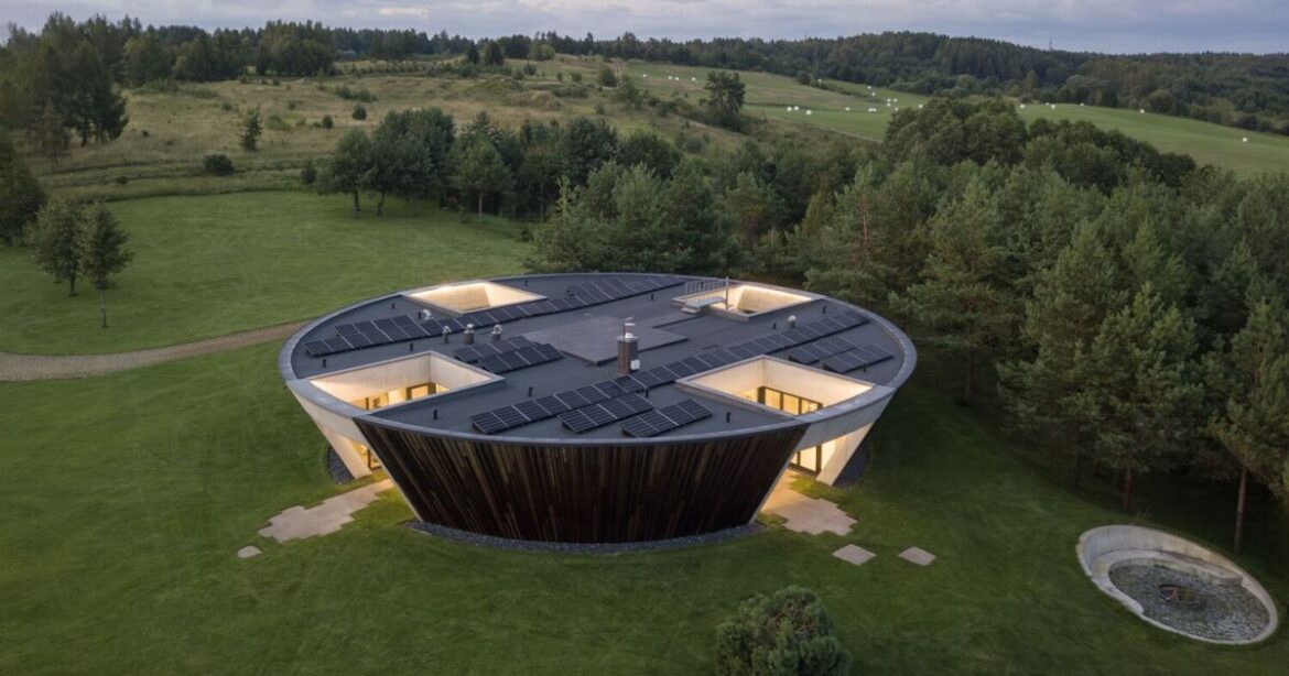 Circular home with sunken gardens in Lithuania