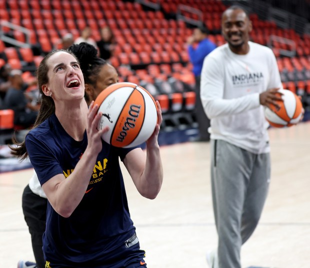 Caitlin Clark of the Indiana Fever warms up before the...