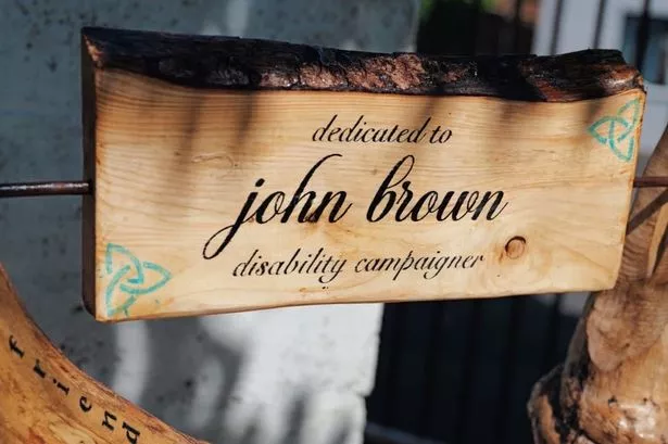 A memorial for John Brown in the community garden