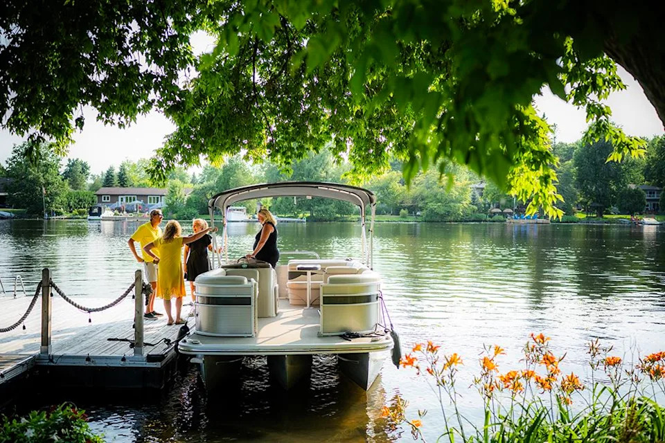 Guests not only enjoyed sitting by the Rideau River but also had the chance to cruise along the Manotick banks on pontoon boat tours.