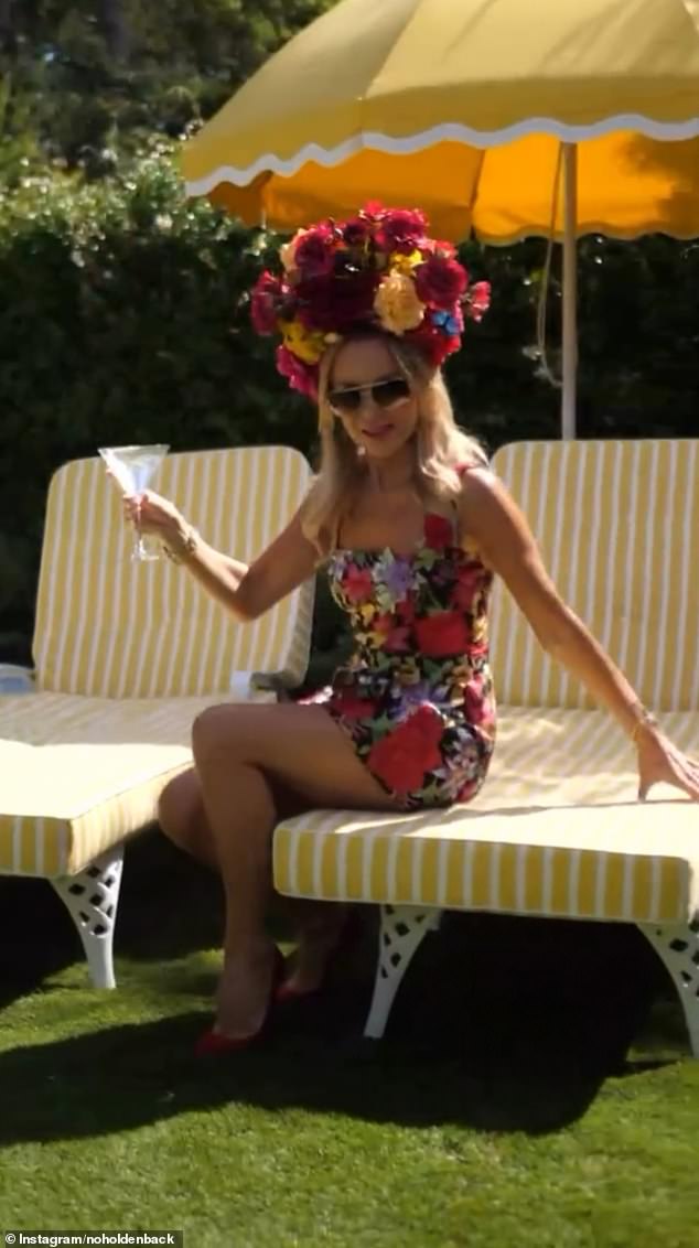 She also served cocktails and was spotted with a martini glass