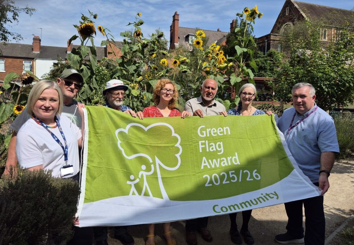 Walsall community garden raises the Green Flag for seventh year running Sarah Clarke, Steve Breeze, David Lawrence, Anna Webster, Mohamed Arif, Estelle Fisher and Cllr Adrian Andrew celebrate by raising the Green Flag.