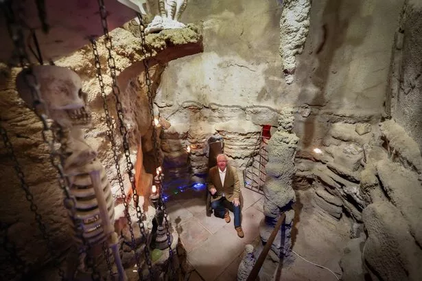 Francis Proctor in the cave at the bottom of his garden in Southport