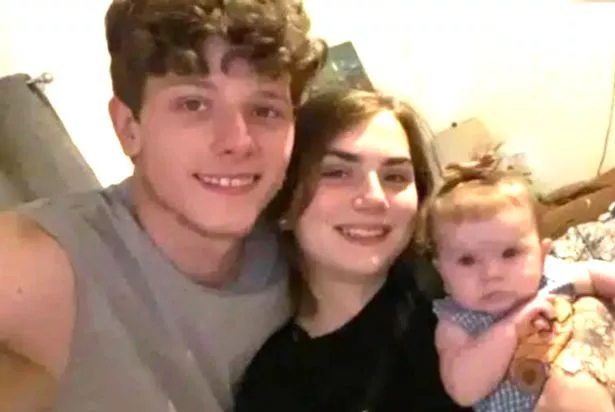 A photo of James M. Wilson, 21, and Adrianna Williams, 20, and their girl 