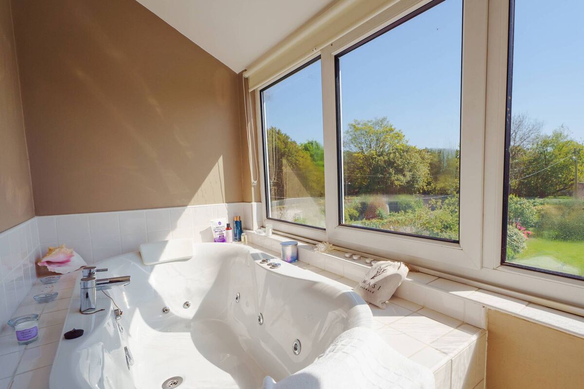 Jetted bath up on the top floor is a look-out perch