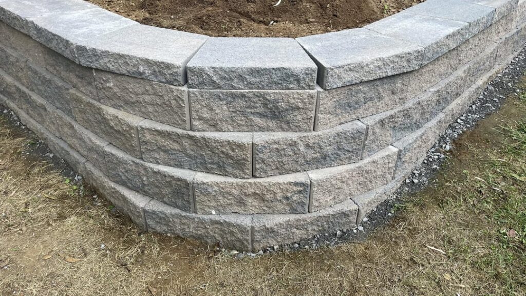 What’s the trick to get these retaining wall tops aligned What’s the trick to get these retaining wall tops aligned
