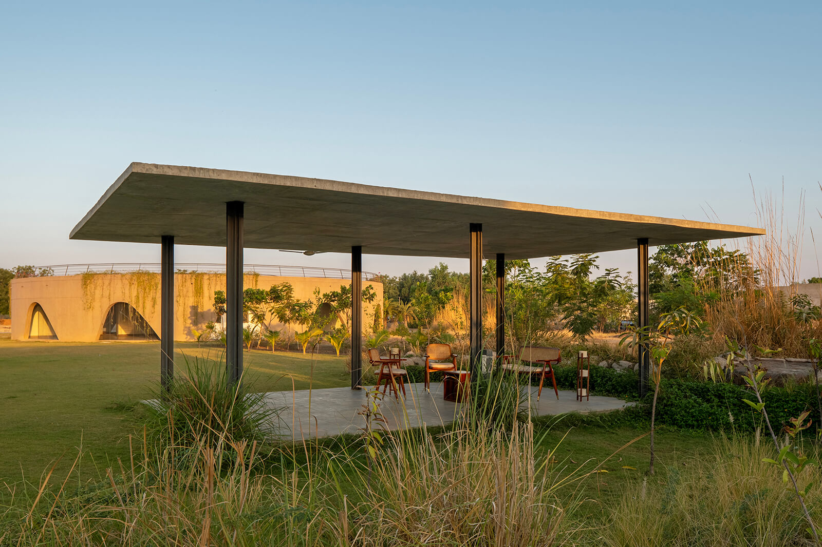 Outdoor seating is provided in the surrounding garden | Habitat 0 | RA Design Studio | STIRworld