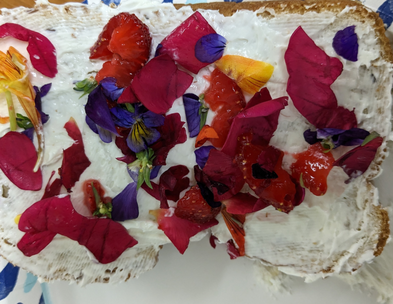 A sandwich decorated with flowers