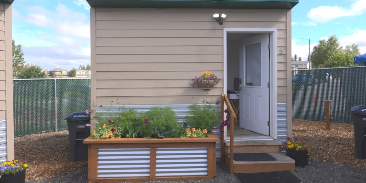 A tiny home project for homeless seniors is in bloom, thanks to garden volunteers