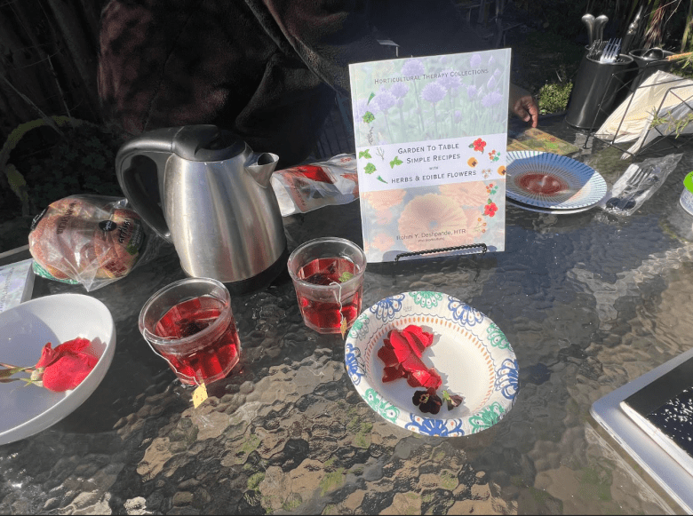 A teapot and flower-inspired snacks