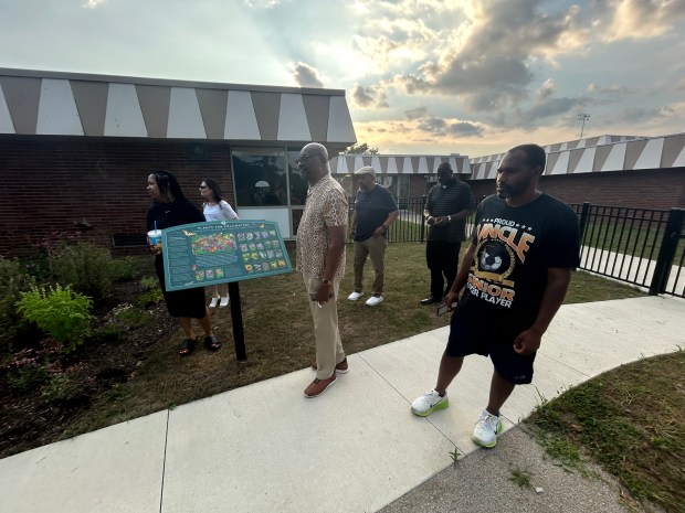 Richmond Heights Local Schools board members, and City Councilperson for Ward 4 Brian Silver, go on a field trip to view a new garden outside their Elementary School. (Frank Mecham- The News-Herald)
