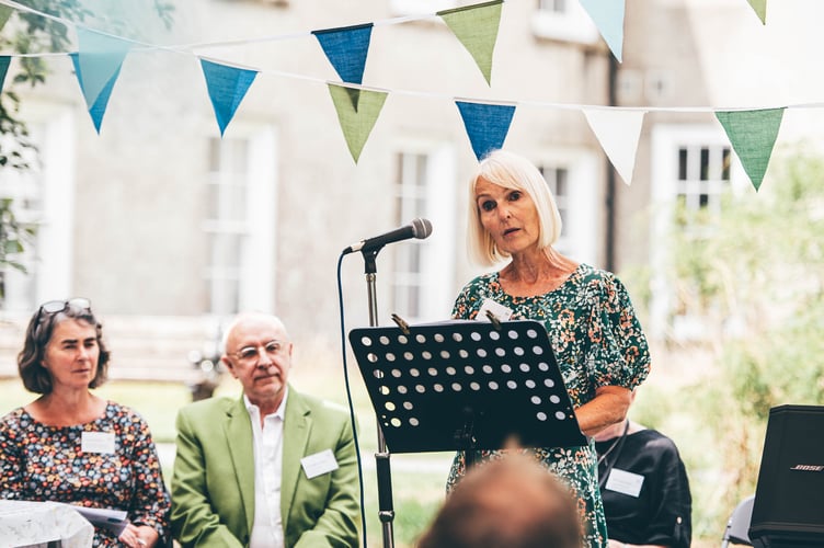 2025_07_30_TGT_walled_garden_launch-34.Tywi_Gateway_Trust_Chair,_Betsan_Caldwell_addresses_launch_party.With_Prof._Pedr_ap_Lwyd&Project_Manager_Teresa_Walters.Photo_AledLlewelyn.