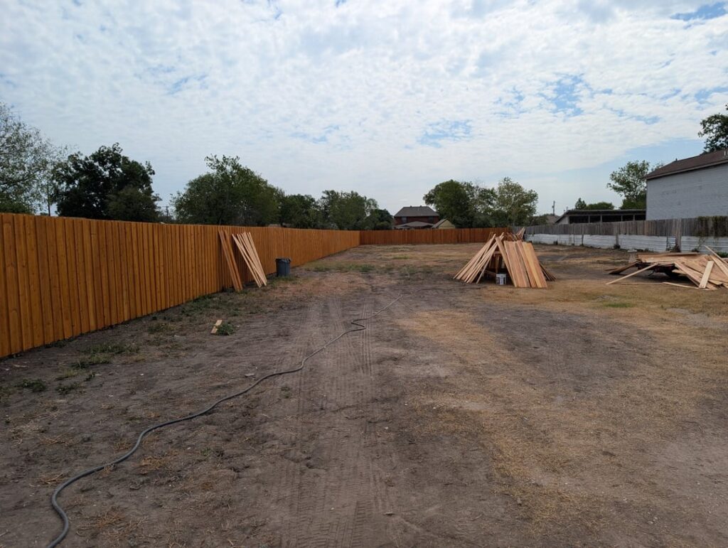 I have a 260 ft by 66 ft yard and just thinking of what would be some good ideas on what i  should put in besides grass.  San Antonio Texas.  Also notice that all the yard is having huge cracks not sure why.