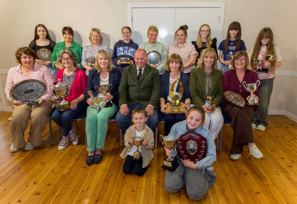 Caithness County Show flower section winners receive their trophies