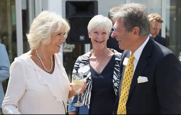 COWES, UNITED KINGDOM - JULY 24:  Camilla, Duchess of Cornwall speaks to Alan Titchmarsh and his wife Alison Titchmarsh as she attends a reception at the Royal Yacht Squadron on July 24, 2018 in Cowes, Isle of Wight, England. (Photo by Chris Jackson - WPA Pool/Getty Images)