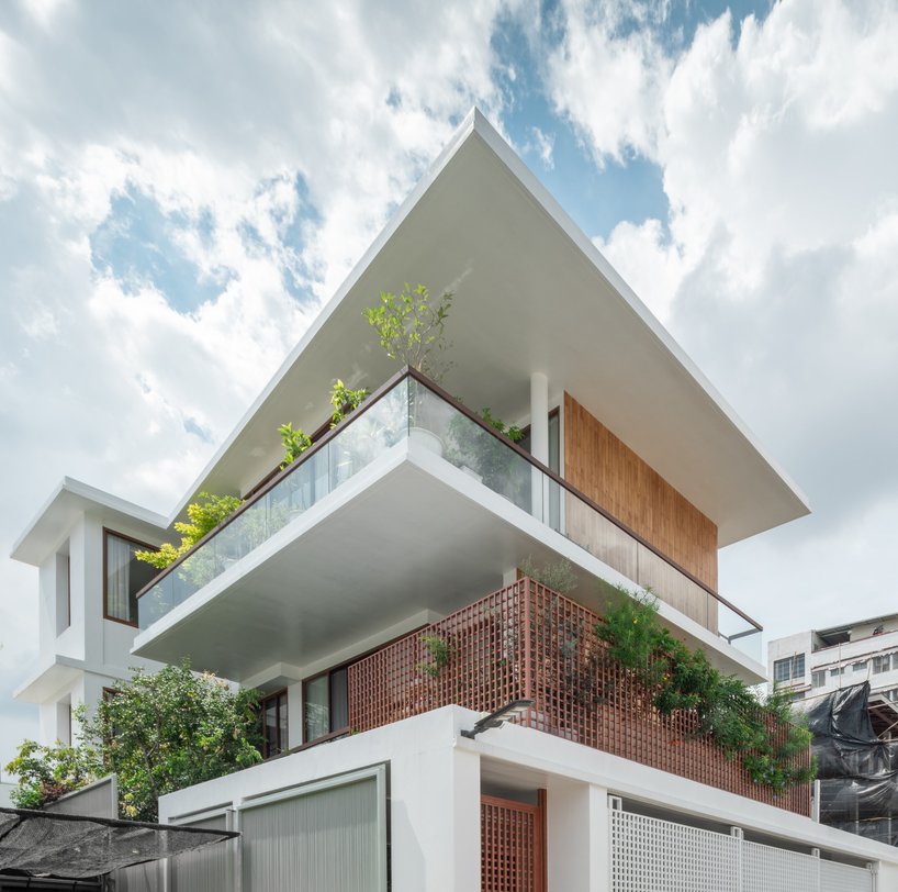 flat12x stacks floating gardens for senior-living house in bangkok