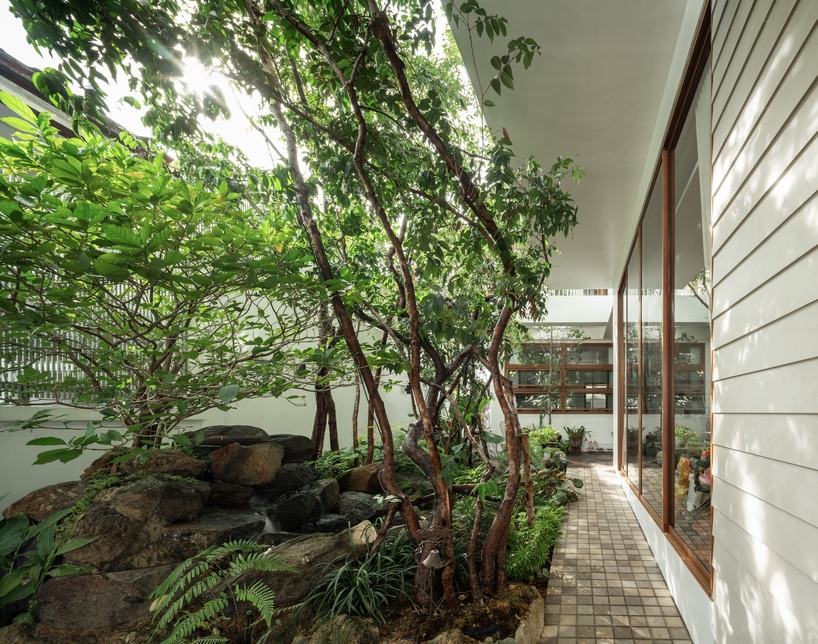flat12x stacks floating gardens for senior-living house in bangkok