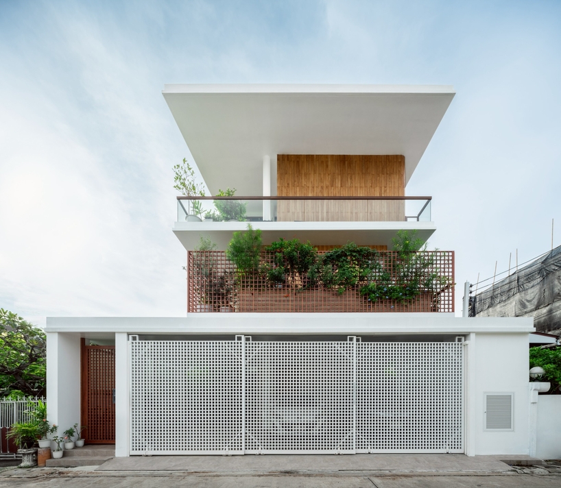 flat12x stacks floating gardens for senior-living house in bangkok