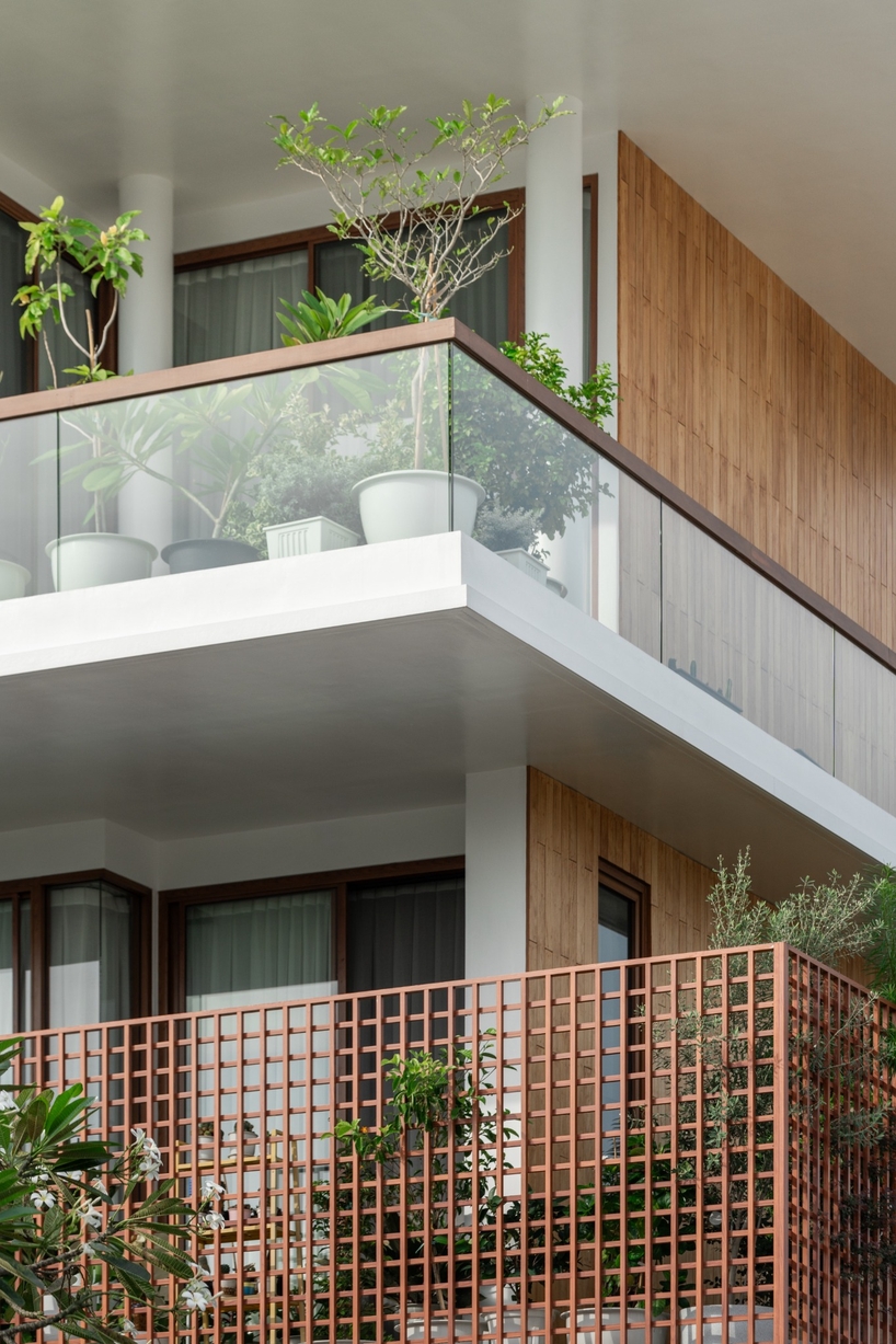 flat12x stacks floating gardens for senior-living house in bangkok