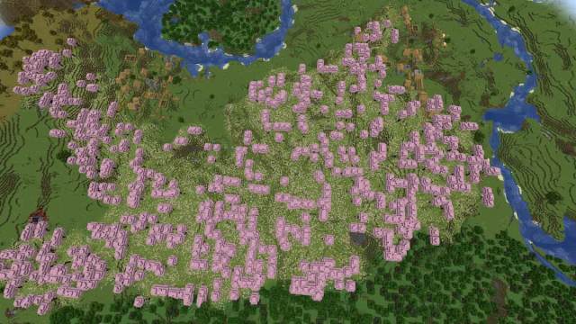 A large Minecraft Cherry Grove with two Plains Villages and a ruined Nether portal