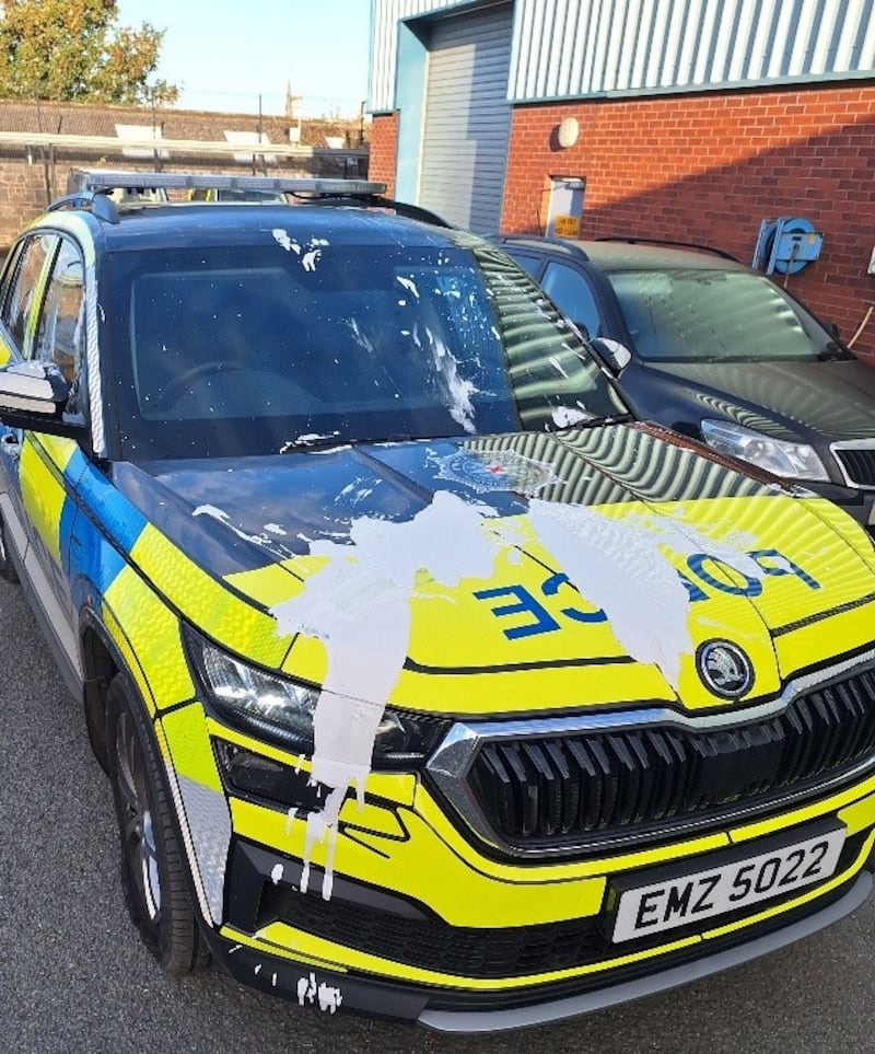 The group slashed two of the tyres and threw paint over the car PICTURE: PSNI
