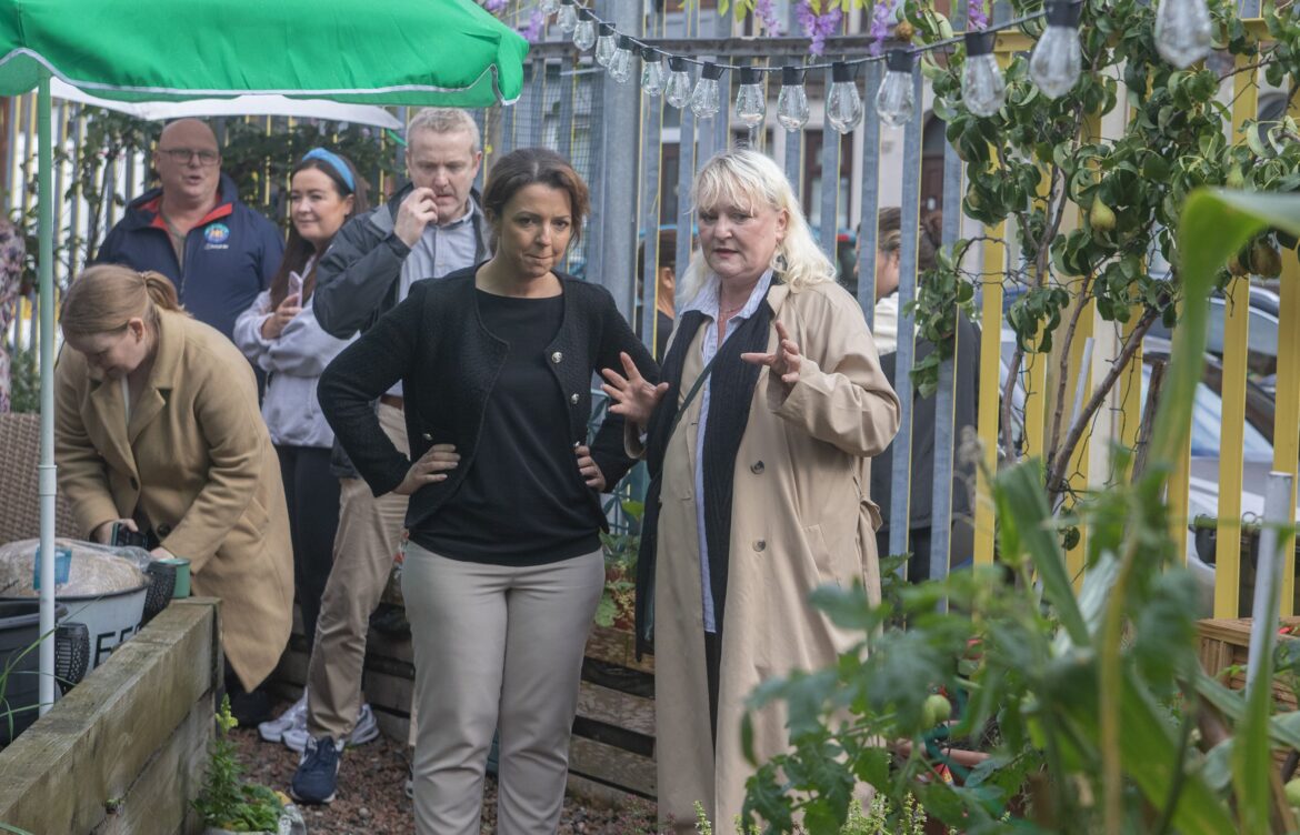 Community gardens set to grow and grow, Minister hears during Falls visit VISIT: Minister Liz Kimmons with Brenda Gough from Three Sisters