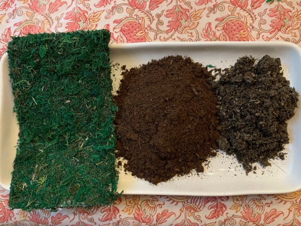Some of the supplies needed to make a kokedama, from left: sheet moss, peat moss and potting mix. (Jessica Damiano file via AP)